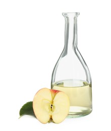 Natural apple vinegar and fresh fruit on white background