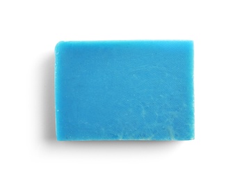 Hand made soap bar on white background, top view