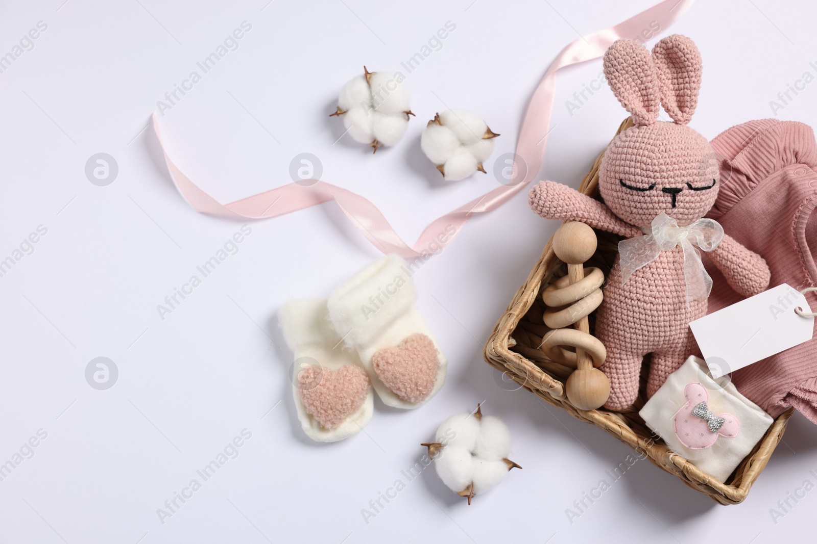 Photo of Flat lay composition with different baby accessories on white background, space for text