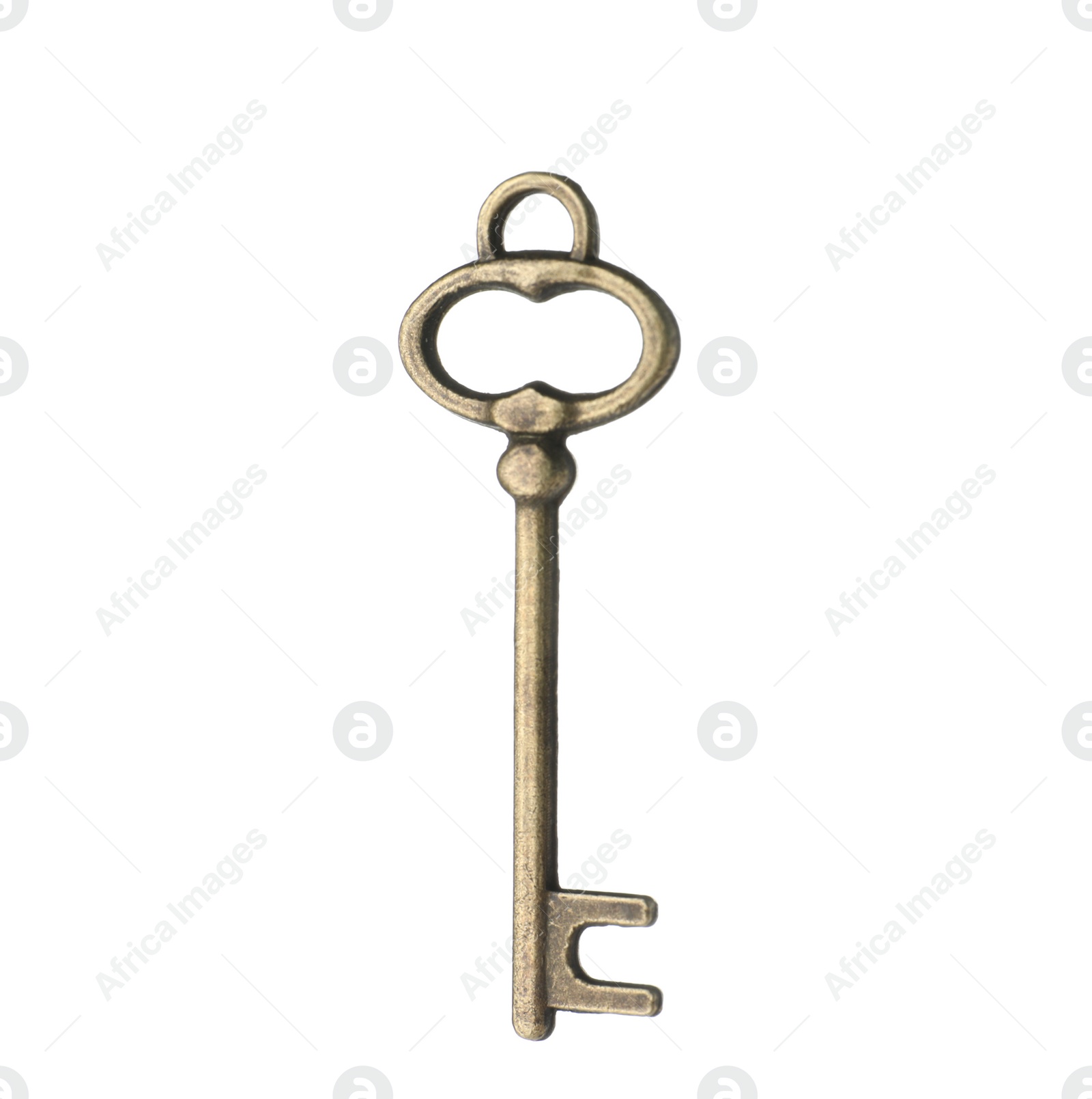 Photo of Bronze vintage ornate key on white background