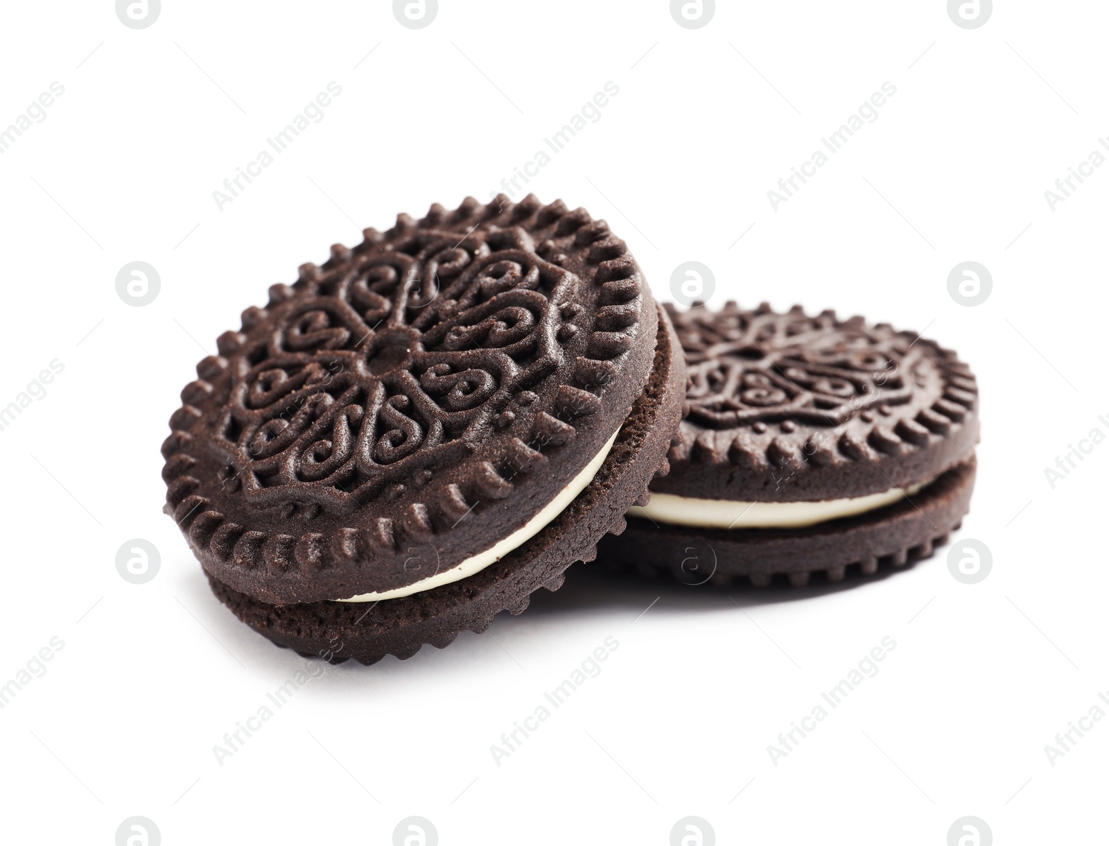 Photo of Tasty chocolate cookies with cream on white background