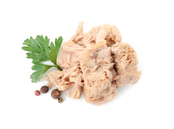 Photo of Delicious canned tuna chunks on white background, top view
