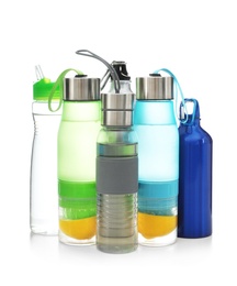 Photo of Different water bottles for sports on white background