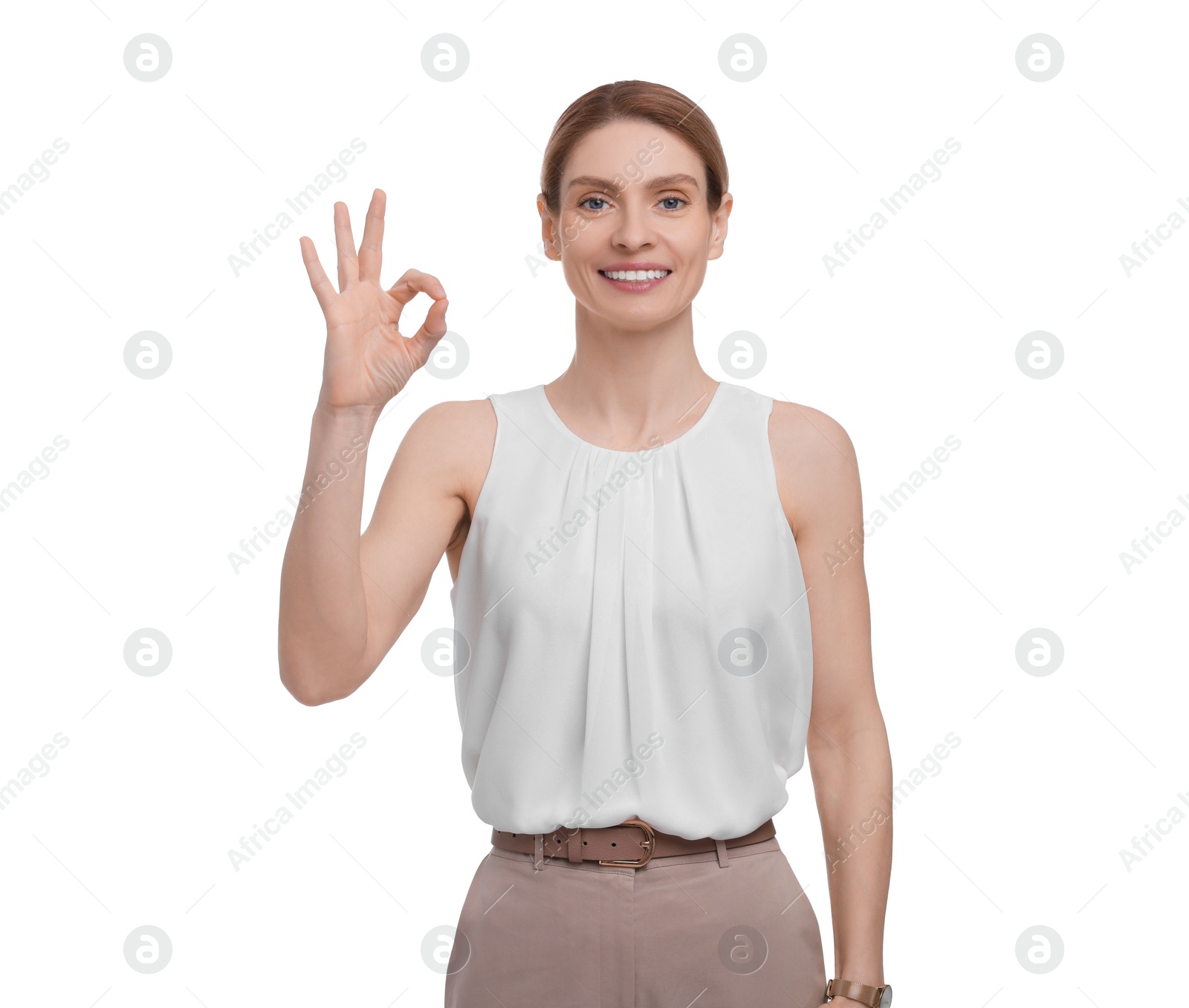 Photo of Beautiful happy businesswoman showing ok gesture on white background