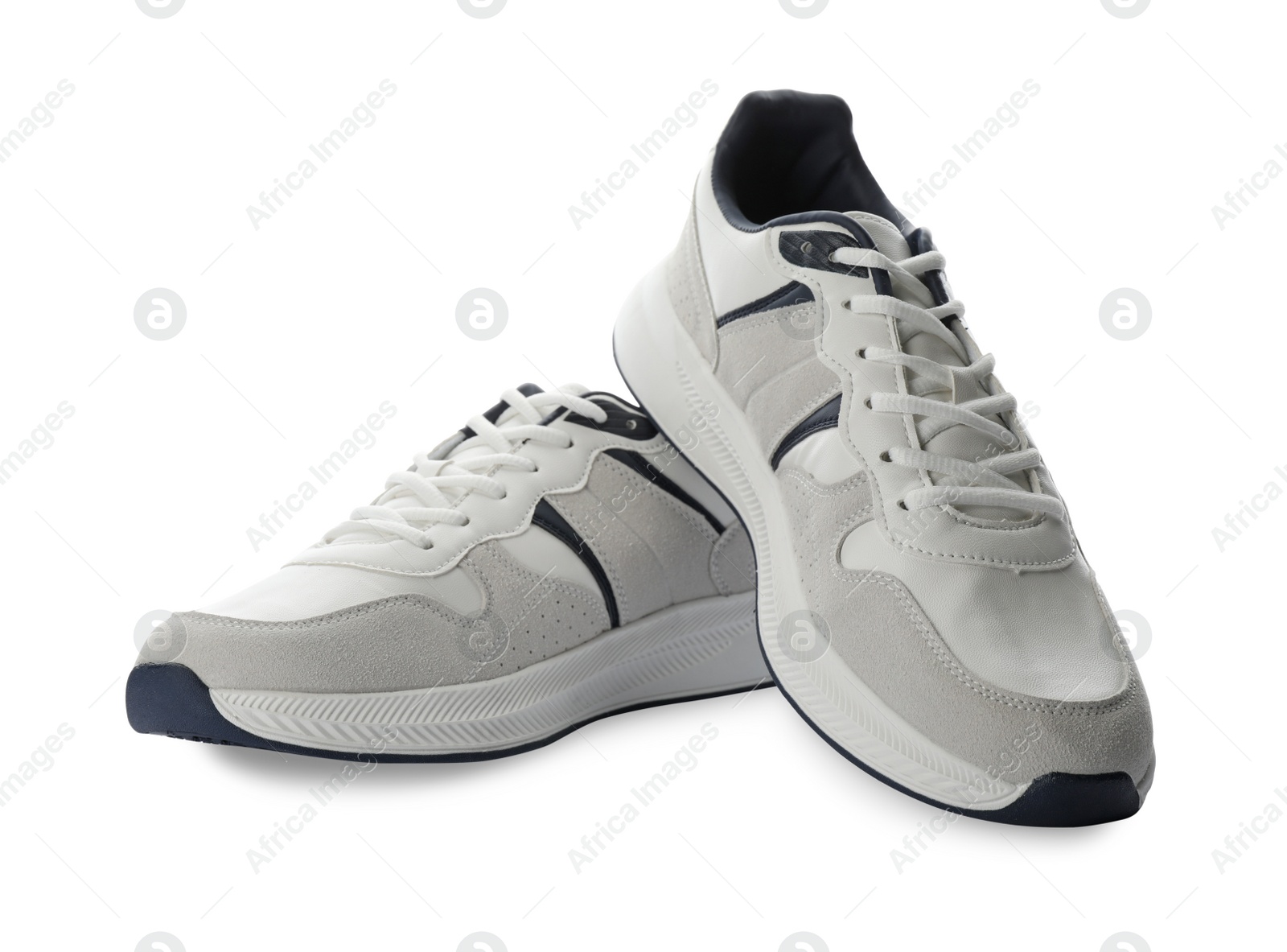 Photo of Pair of stylish sneakers on white background