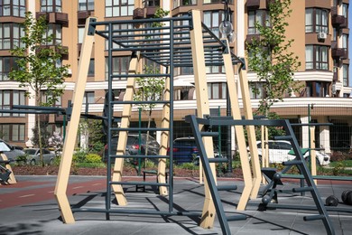 Empty outdoor gym with different sport simulators in residential area