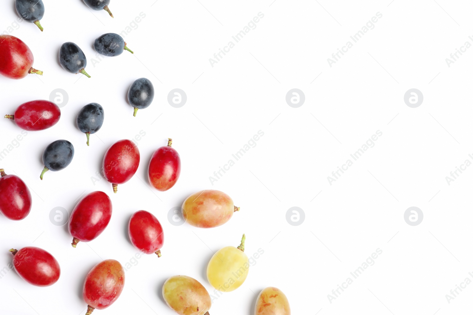 Photo of Fresh ripe juicy grapes on white background, top view. Space for text