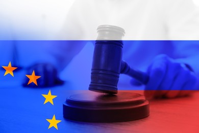 Image of Multiple exposure of judge with gavel, Europenean Union and Russian flags. Concept of sanctions against Russia