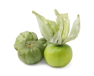 Fresh green tomatillos with husk isolated on white