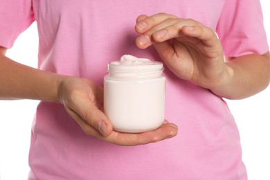 Photo of Woman taking hand cream from jar on white background, closeup