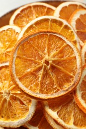 Bowl of dry orange slices, closeup view