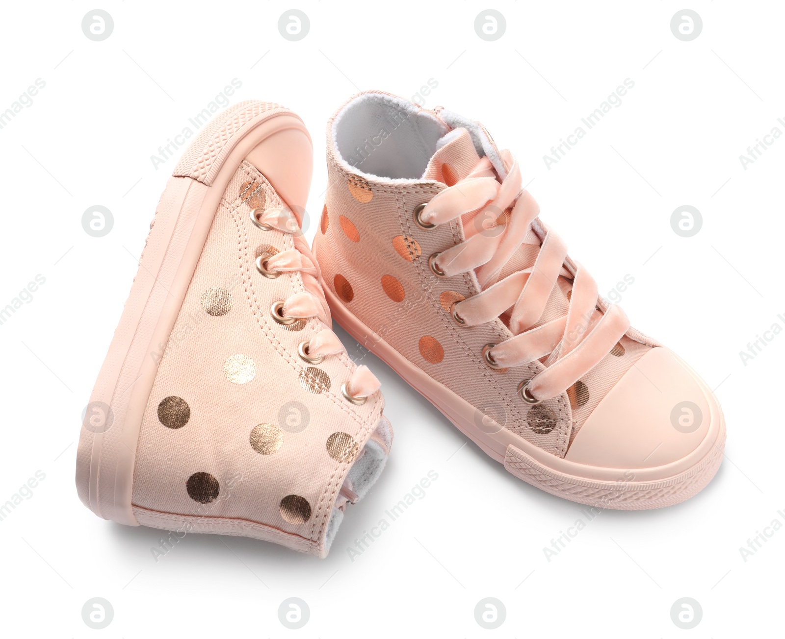 Photo of Pair of stylish child shoes on white background