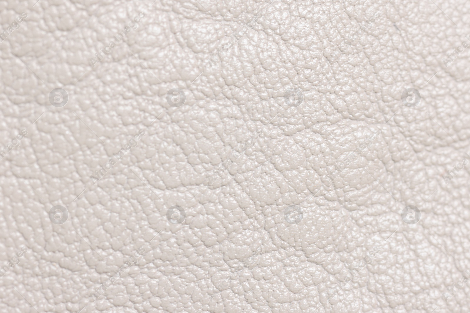 Photo of Beautiful beige leather as background, top view