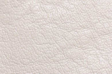 Photo of Beautiful beige leather as background, top view