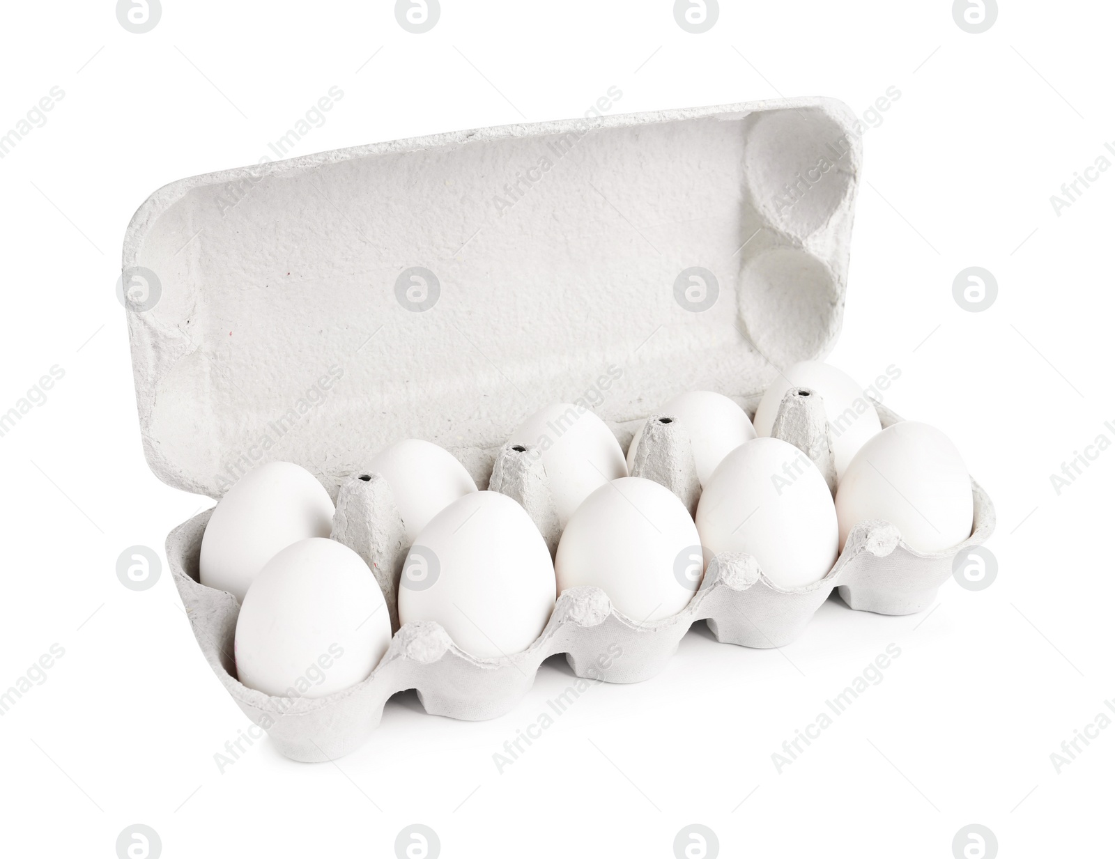 Photo of Chicken eggs in cardboard box isolated on white