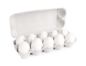 Photo of Chicken eggs in cardboard box isolated on white