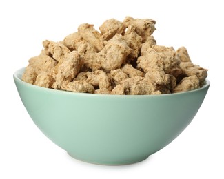 Photo of Dehydrated soy meat chunks in bowl on white background