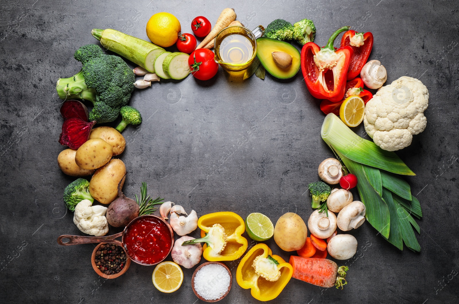 Photo of Flat lay composition with fresh products on grey table, space for text. Healthy cooking