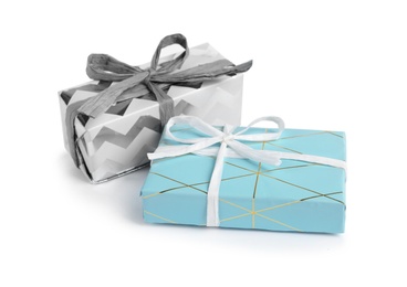 Photo of Beautiful gift boxes with ribbons on white background