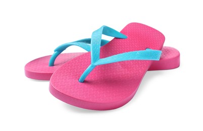 Photo of Pair of pink flip flops isolated on white