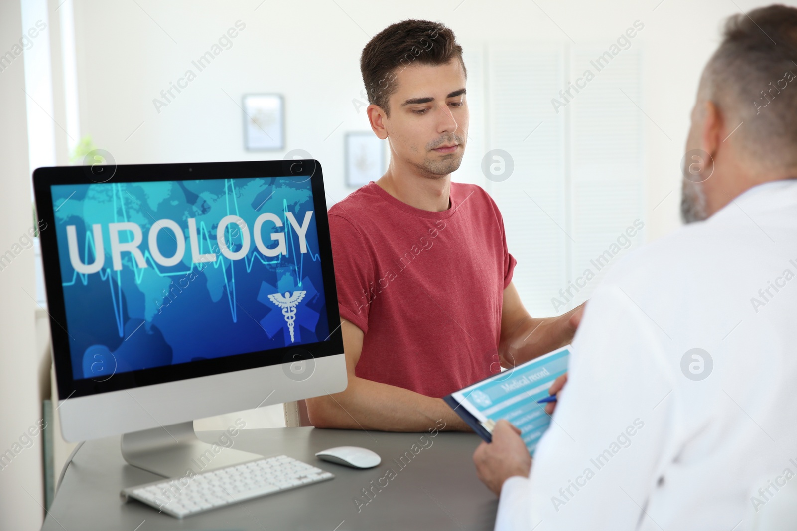 Photo of Man with health problem visiting urologist at hospital