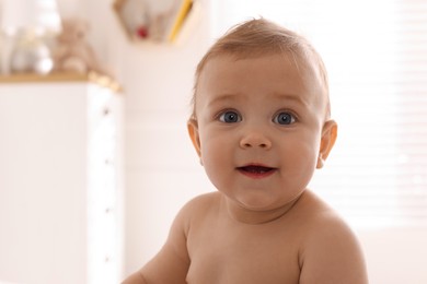 Photo of Portrait of cute little baby at home