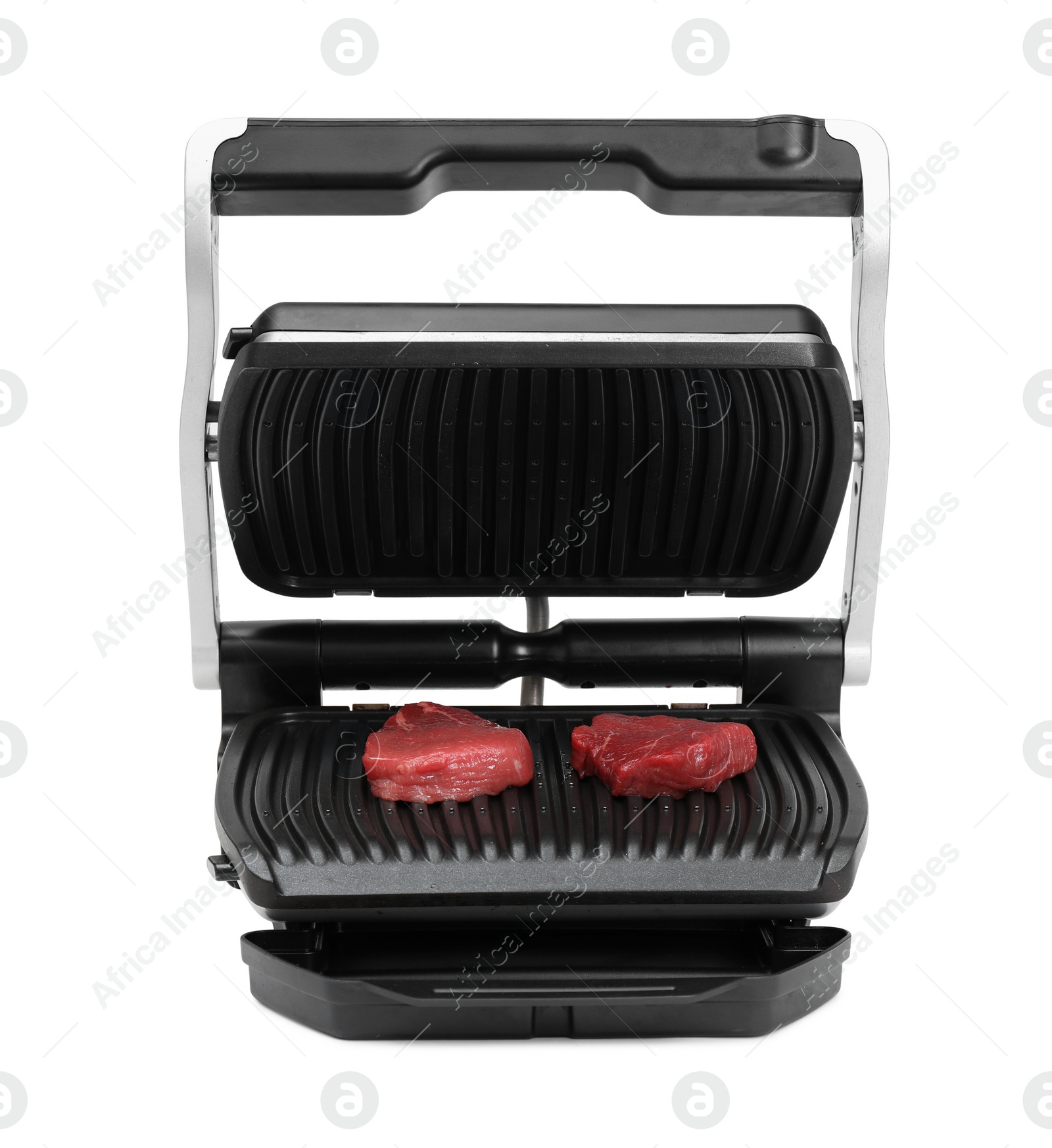 Photo of Electric grill with raw meat steaks isolated on white