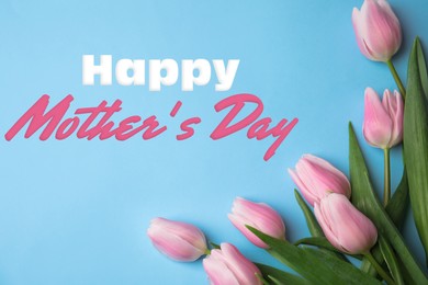 Image of Happy Mother's Day. Beautiful tulips on light blue background, flat lay