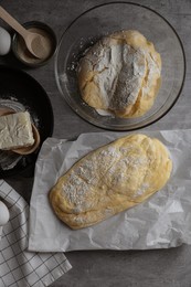 Dough, eggs and flour on light grey table, flat lay. Cooking ciabatta