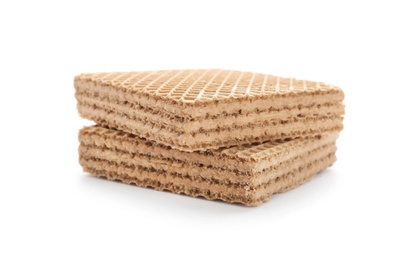 Delicious crispy wafers on white background. Sweet food