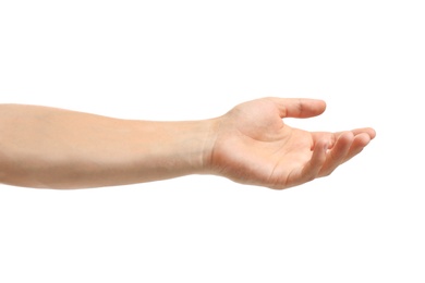 Photo of Young man held out hand on white background, closeup