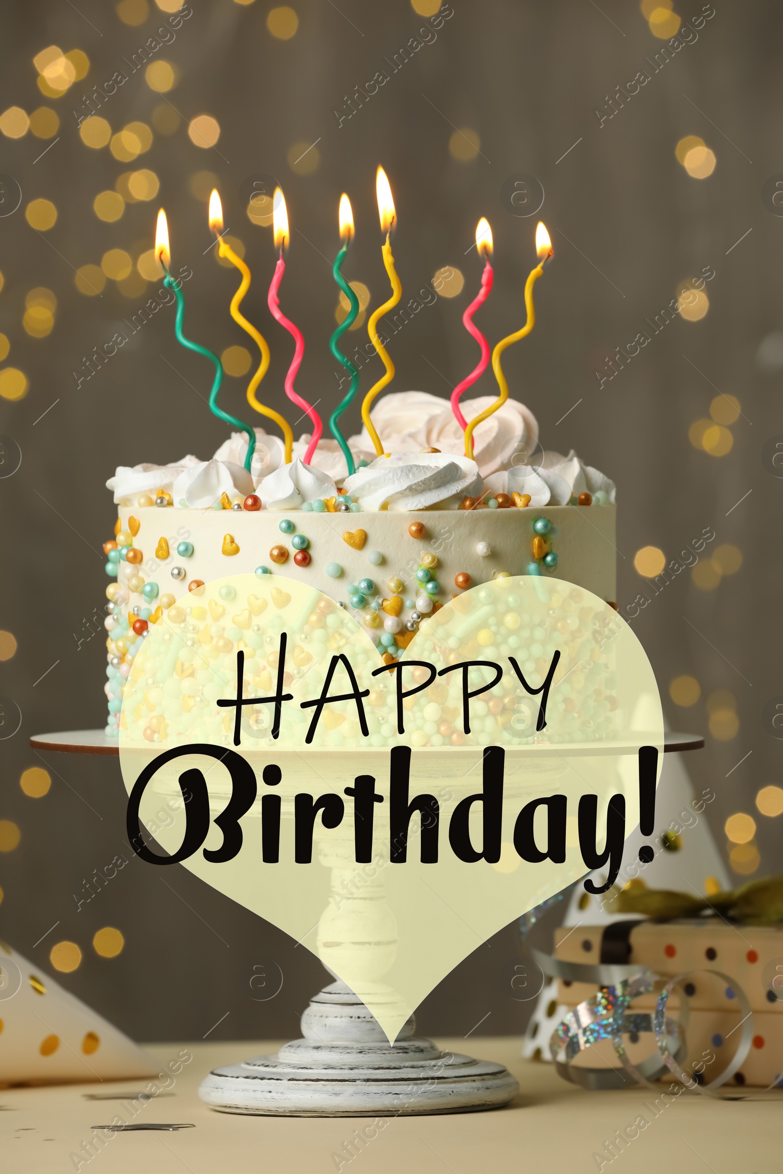 Image of Happy Birthday! Beautiful cake with burning candles and decor on white table