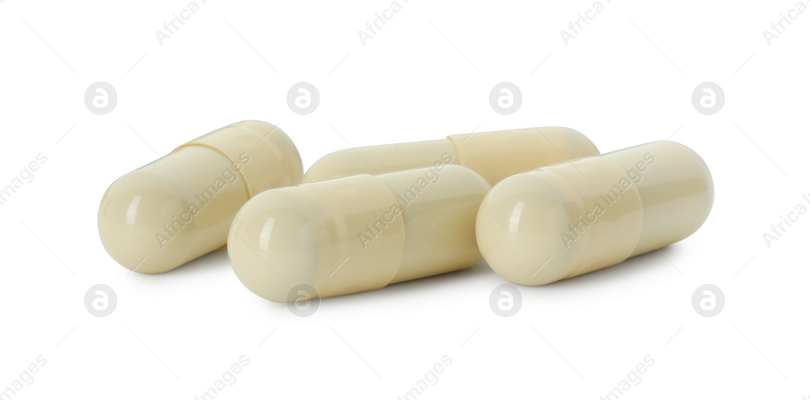 Photo of Vitamin capsules isolated on white. Health supplement