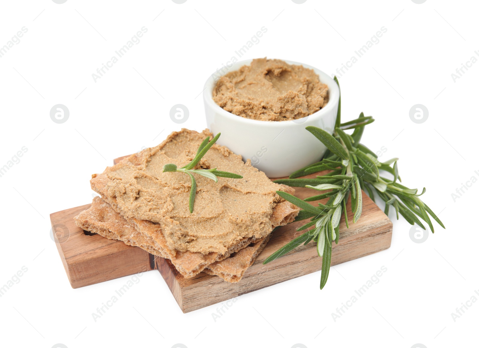 Photo of Crispy crackers with delicious meat pate and rosemary on white background