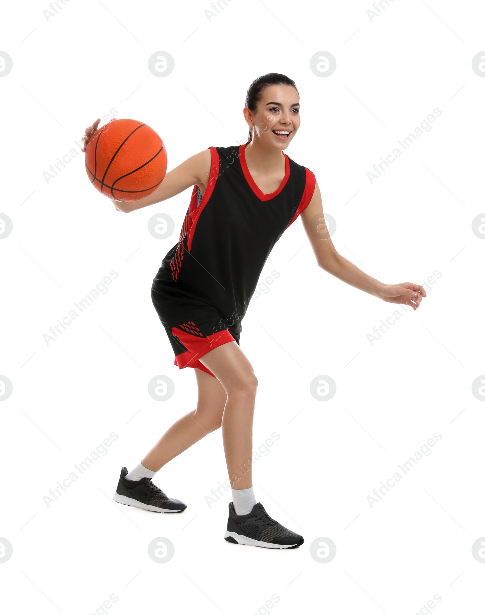 Photo of Professional sportswoman playing basketball on white background