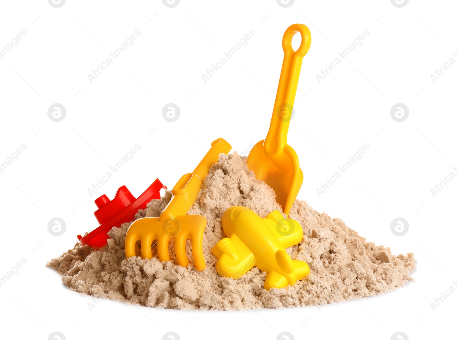 Photo of Plastic beach toys on pile of sand against white background. Outdoor play