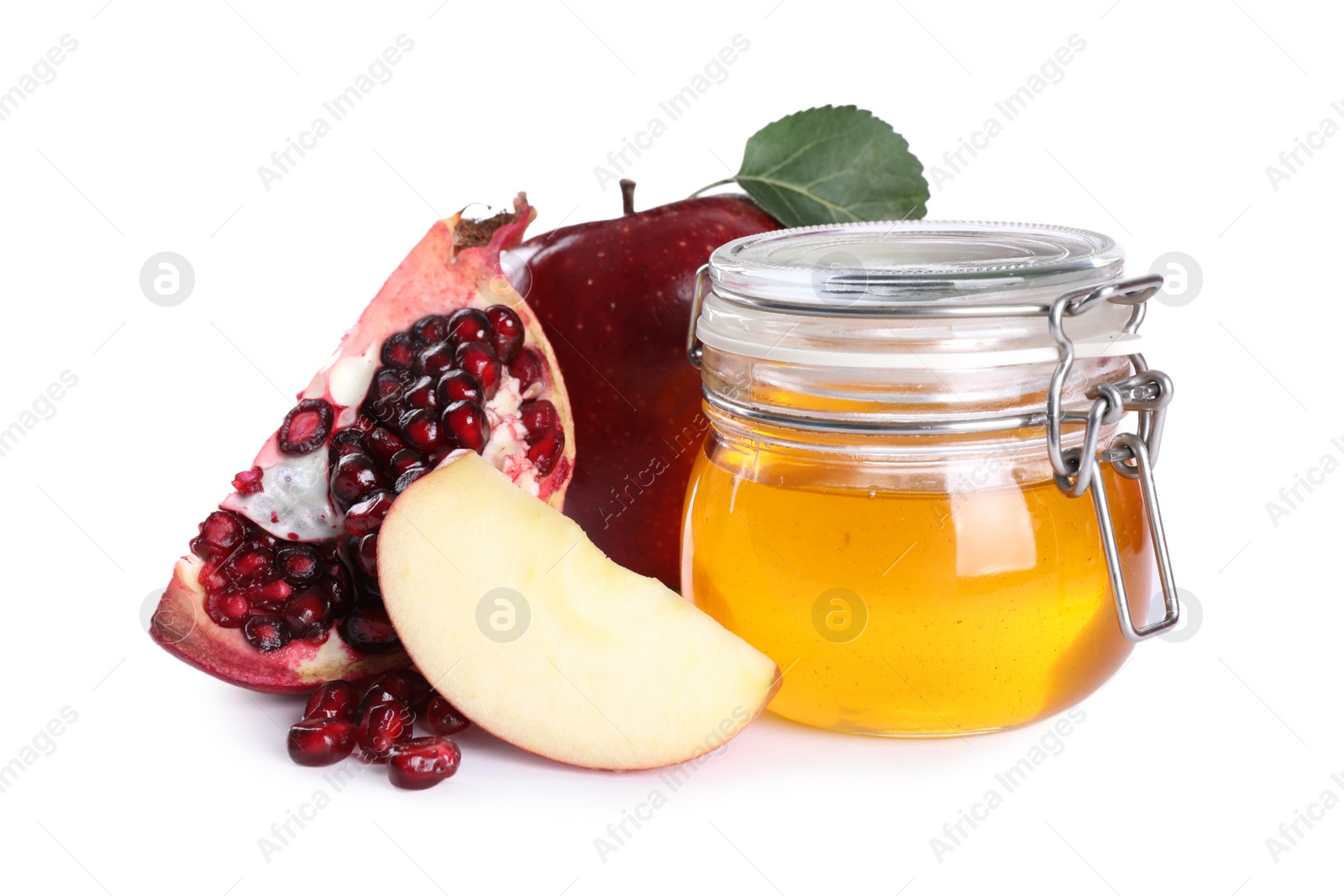 Photo of Honey, apples and pomegranate on white background. Rosh Hashanah holiday