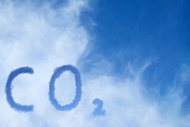 Image of CO2 emissions. View of blue sky with white clouds