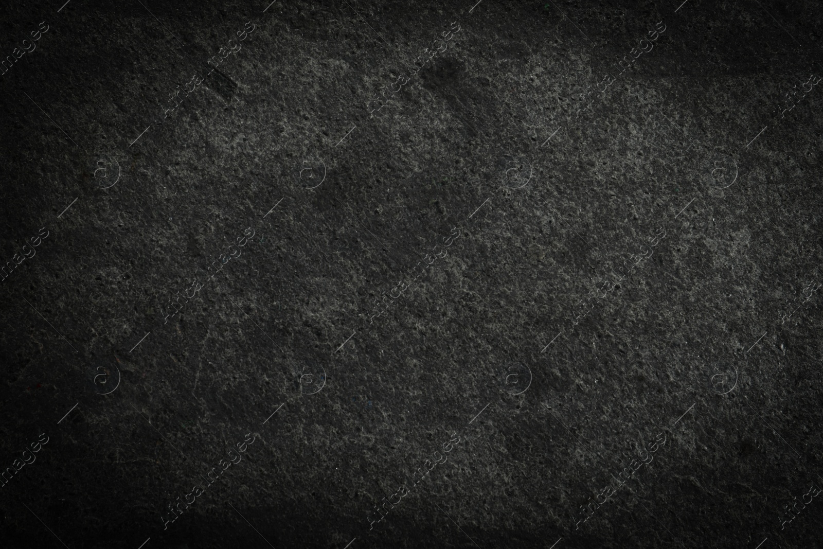 Image of Texture of dark grey stone surface as background, closeup