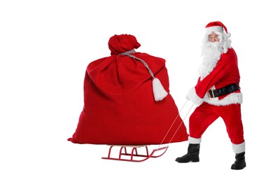 Image of Santa Claus with big red bag full of Christmas presents on sled against white background