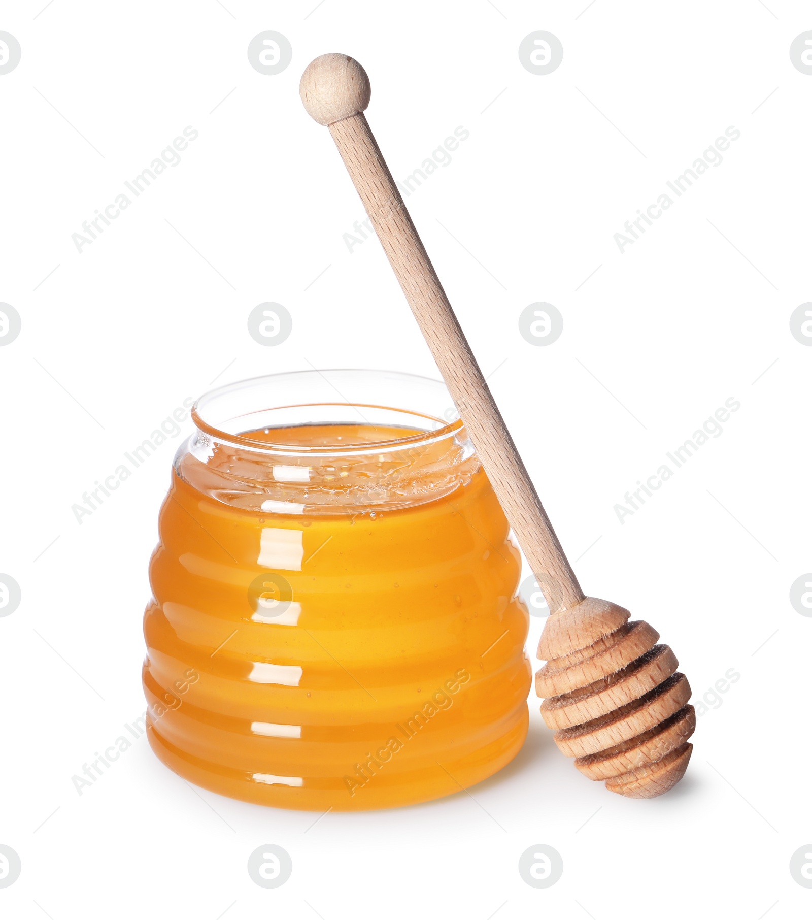 Photo of Tasty natural honey in glass jar and dipper isolated on white