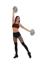 Photo of Beautiful cheerleader in costume holding pom poms on white background