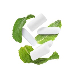 Image of Fresh mint leaves and chewing gum pads falling on white background