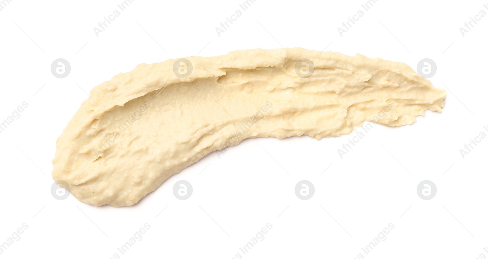 Photo of Smear of tasty hummus isolated on white, top view