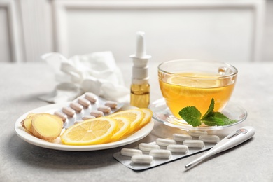 Photo of Natural and medical cold remedies on table