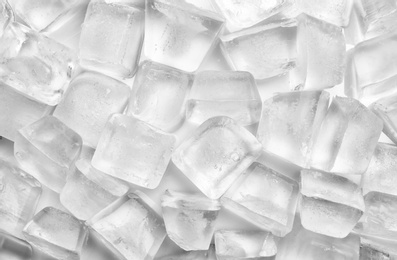 Pile of ice cubes on white background