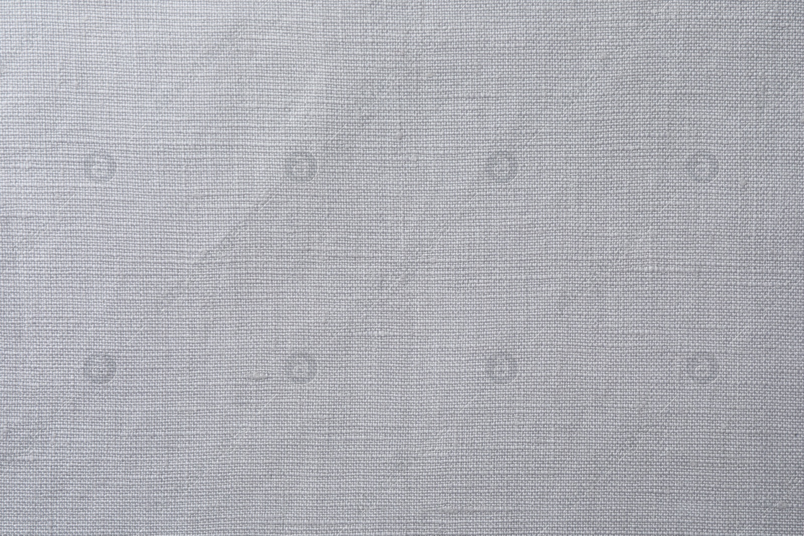 Photo of Texture of light grey fabric as background, top view