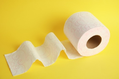 Photo of Toilet paper roll on color background. Personal hygiene