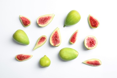 Photo of Fresh ripe figs on white background, top view