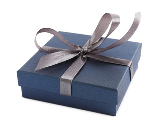 Photo of Blue gift box with satin bow on white background